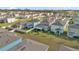 Aerial view showing backyards and outdoor spaces in a neighborhood, complete with patios and lawns at 1669 Swan Swim Dr, Davenport, FL 33837