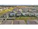 An aerial view of a residential neighborhood highlighting the well-kept backyards and community layout at 1669 Swan Swim Dr, Davenport, FL 33837