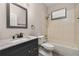 Bathroom featuring a vanity, mirror, toilet, and bathtub with shower at 1741 Eldorado Ct, St Cloud, FL 34771