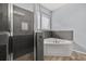 Stylish bathroom with a separate shower and soaking tub with tile surround at 1741 Eldorado Ct, St Cloud, FL 34771