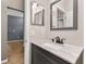 Bathroom featuring a vanity, sink, mirror, and tile flooring with a view into another room at 1741 Eldorado Ct, St Cloud, FL 34771