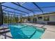 Lovely screened-in pool offering a private oasis for swimming and outdoor fun with a covered patio at 1741 Eldorado Ct, St Cloud, FL 34771