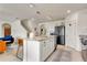 Open kitchen with a central island, granite countertops, and stainless steel appliances at 1755 Buckeye Rd, Davenport, FL 33837