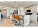 Beautiful eat-in kitchen features a large island, modern countertops and stainless steel appliances at 1755 Buckeye Rd, Davenport, FL 33837