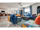 Open-concept living room connecting the kitchen and dining area with modern decor and plenty of space at 1755 Buckeye Rd, Davenport, FL 33837