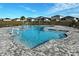 Beautiful community pool with a zero entry, beach entry, and fun water features and lounging at 1755 Buckeye Rd, Davenport, FL 33837