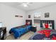 Themed bedroom with two twin beds and matching decor at 238 N Hampton Dr, Davenport, FL 33897