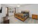 Bright bedroom featuring a ceiling fan and a large window at 238 N Hampton Dr, Davenport, FL 33897