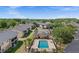 Aerial view of the community showcasing the pool, tennis court and residential buildings at 2424 Barley Club Ct # 8, Orlando, FL 32837