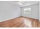 Inviting bedroom with window, ceiling fan, and ample natural light at 2424 Barley Club Ct # 8, Orlando, FL 32837