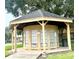 Community mail kiosk with multiple mailboxes and a covered structure for resident convenience at 2424 Barley Club Ct # 8, Orlando, FL 32837