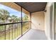 Enjoy the fresh air on this screened balcony offering views of the surrounding lush landscaping at 2424 Barley Club Ct # 8, Orlando, FL 32837