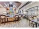 A stylishly decorated bar with plenty of seating in the community center at 246 Tomelloso Way, Davenport, FL 33837