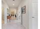 Hallway with tile flooring, art decorations, and arched entryway at 246 Tomelloso Way, Davenport, FL 33837