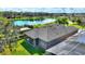 A screened in lanai and an expansive rear yard are overlooked by the rear of this house at 246 Tomelloso Way, Davenport, FL 33837