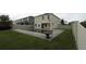 A backyard with a pool and beautiful landscaping perfect for outdoor entertaining or relaxation at 3199 Turret Dr, Kissimmee, FL 34743