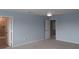 Spacious bedroom features soft carpeting, neutral walls, and ceiling fan with light at 3199 Turret Dr, Kissimmee, FL 34743