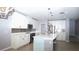 Well-equipped kitchen with an island with sink and modern appliances at 3199 Turret Dr, Kissimmee, FL 34743