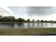 Scenic lake view providing a serene and picturesque backdrop to the property at 3199 Turret Dr, Kissimmee, FL 34743