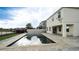 Beautiful backyard pool and patio area with an outdoor living space and a lake view at 3199 Turret Dr, Kissimmee, FL 34743