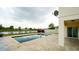 Gorgeous pool area with lake views, creating a serene and private outdoor oasis at 3199 Turret Dr, Kissimmee, FL 34743