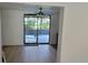 Open dining area with a sliding glass door leading to an outdoor patio or sunroom at 332 Carolina Ave, St Cloud, FL 34769