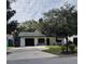 Charming single-story home with a well-maintained front yard and attached garage at 332 Carolina Ave, St Cloud, FL 34769