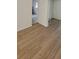 Spacious living room with stylish wood-look flooring and an open layout at 332 Carolina Ave, St Cloud, FL 34769