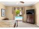 Bedroom with ornate bedspread, wood furniture, and poolside view at 3329 Schoolhouse Rd, Harmony, FL 34773