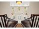 Grand foyer featuring a soaring ceiling and ornate chandeliers at 3329 Schoolhouse Rd, Harmony, FL 34773