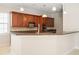 Beautiful kitchen boasting custom wood cabinets and stainless steel appliances at 3329 Schoolhouse Rd, Harmony, FL 34773
