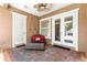 Cozy outdoor patio with brick flooring, comfortable seating, and access to the backyard at 3329 Schoolhouse Rd, Harmony, FL 34773