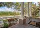 Charming view from the front porch showcasing the neighborhood's serene landscape and natural beauty at 3329 Schoolhouse Rd, Harmony, FL 34773