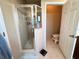 Bathroom showing glass enclosed shower and a separate toilet area for added convenience at 3491 Allegra Cir, St Cloud, FL 34772