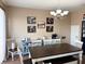 Bright dining room features a chandelier, large table, and stylish furnishings at 3491 Allegra Cir, St Cloud, FL 34772