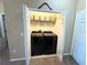 Convenient laundry closet featuring side-by-side washer and dryer, enhancing functionality at 3491 Allegra Cir, St Cloud, FL 34772