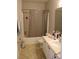 A full bathroom with tub and shower combination and white vanity sink at 350 Chelmsford Ct, Kissimmee, FL 34758