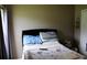 Comfortable bedroom with a neatly made bed, soft bedding, and cozy decor creating a relaxing atmosphere at 350 Chelmsford Ct, Kissimmee, FL 34758