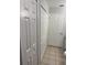Bathroom with multiple closets and tiled floor at 466 Club Dr, Winter Springs, FL 32708