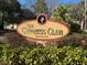 Entrance sign for The Cypress Club community, surrounded by lush greenery at 466 Club Dr, Winter Springs, FL 32708