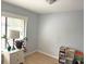 Bright office space with light walls, a large window, and a neutral color scheme at 466 Club Dr, Winter Springs, FL 32708