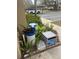 A water softener system is concealed within the lush landscaping near the home at 466 Club Dr, Winter Springs, FL 32708