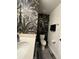 Stylish half bathroom featuring a unique patterned wallpaper, modern sink, and updated fixtures at 4740 Tribute Trl, Kissimmee, FL 34746
