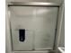 Enclosed tub shower features a modern, glass sliding door and is equipped with a towel rack at 4740 Tribute Trl, Kissimmee, FL 34746