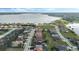 Aerial view of lakeside community showing well-maintained streets and waterfront properties at 4959 Tennessee Lake Dr, Auburndale, FL 33823