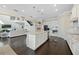 Bright kitchen with open concept featuring a large island and stainless steel appliances at 4959 Tennessee Lake Dr, Auburndale, FL 33823