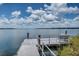 A serene view from the dock, with a bench, at Lake Juliana Estates at 4959 Tennessee Lake Dr, Auburndale, FL 33823