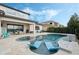 Infinity pool with lounge chairs and spa offers a luxurious outdoor experience at 4959 Tennessee Lake Dr, Auburndale, FL 33823