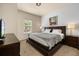 Bedroom featuring a queen sized bed, carpet flooring and ample natural light at 5360 Diplomat Ct # 107, Kissimmee, FL 34746
