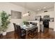 Modern dining area with seating for six, seamlessly connected to the kitchen at 5360 Diplomat Ct # 107, Kissimmee, FL 34746